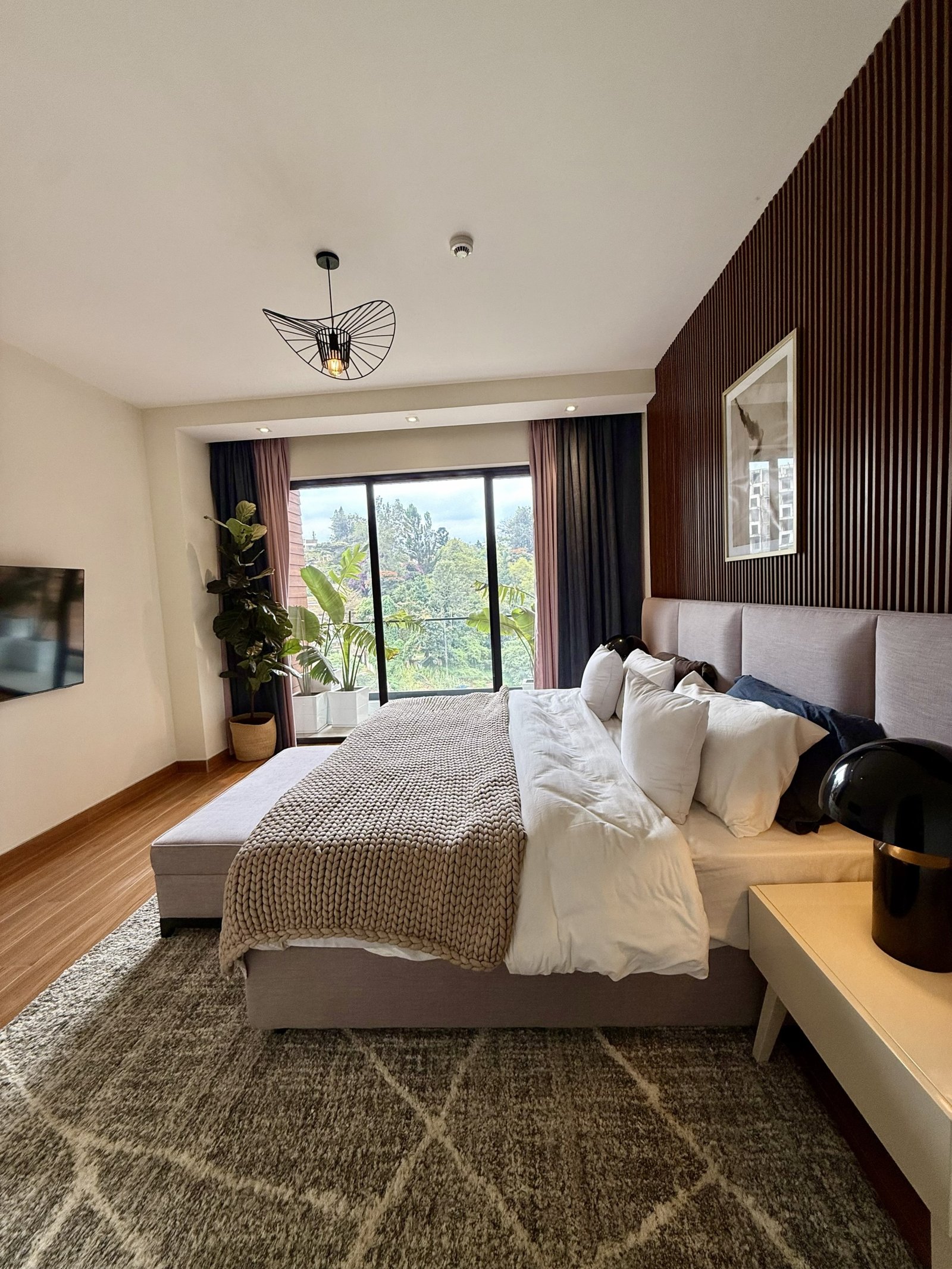 saruni apartments in riverside master bed side view