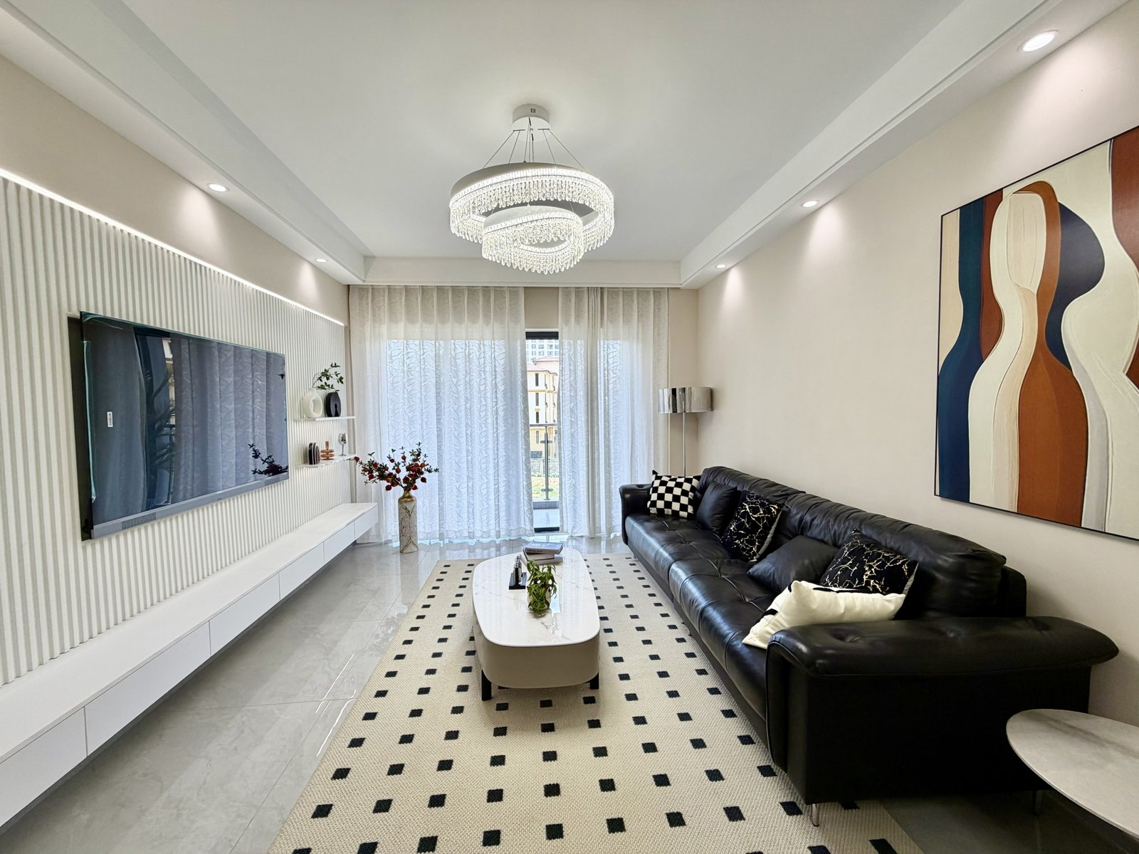 Spacious Living room And Tv Area Of 1 Bedrooms At Modern City Apartments In Kilimani