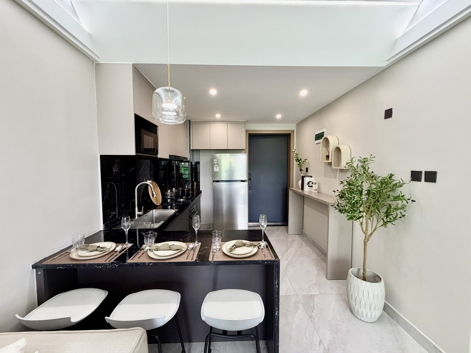 Modern kitched Break fast Table of 1 bedrooms at Oak west Residency In Westlands