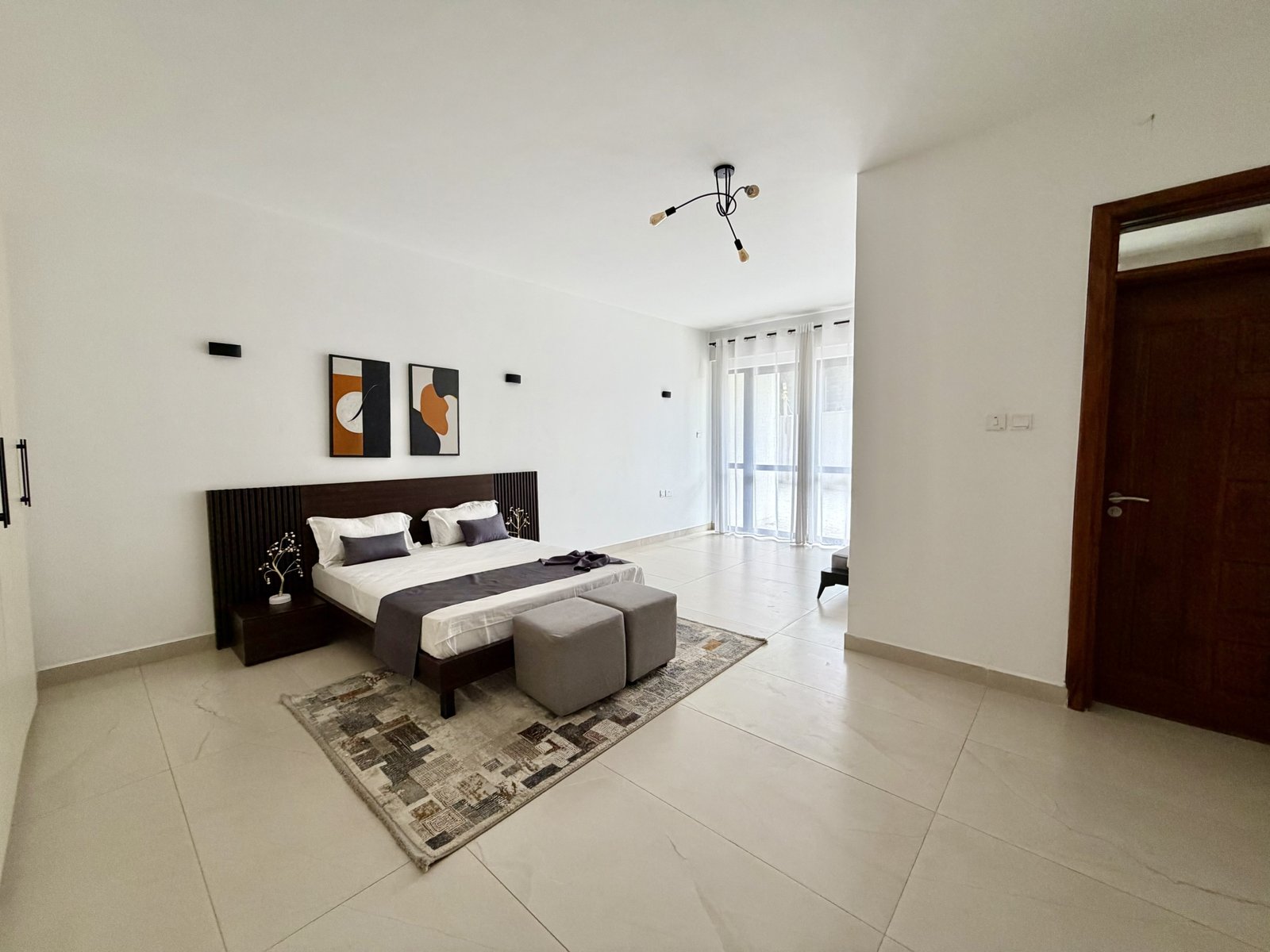 Spacious Bedroom With Abundant Lighting At Emaar Residence Apartment In Westlands