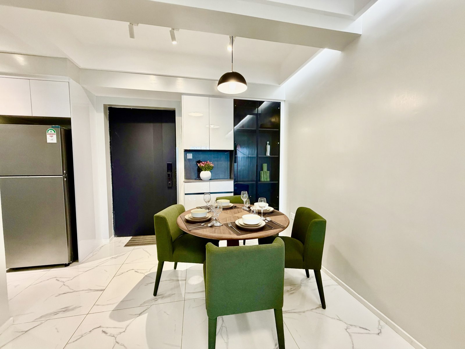 Stylish Dining Area of 1 Bedroom + Study At Ilu Green Homes Apartments In Kilimani