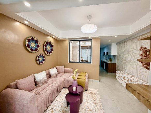 Living room area of 1 Bedrooms At Emerald Residences In Kilimani Side view