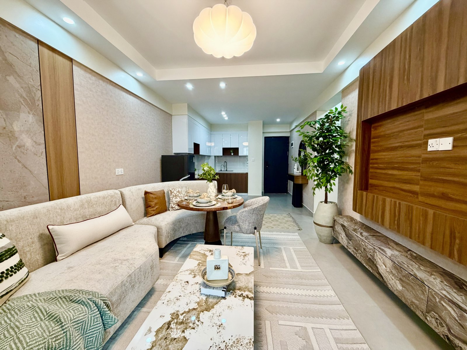 living room area of 1 Bedrooms At Skyline Apartments In Kilimani side view
