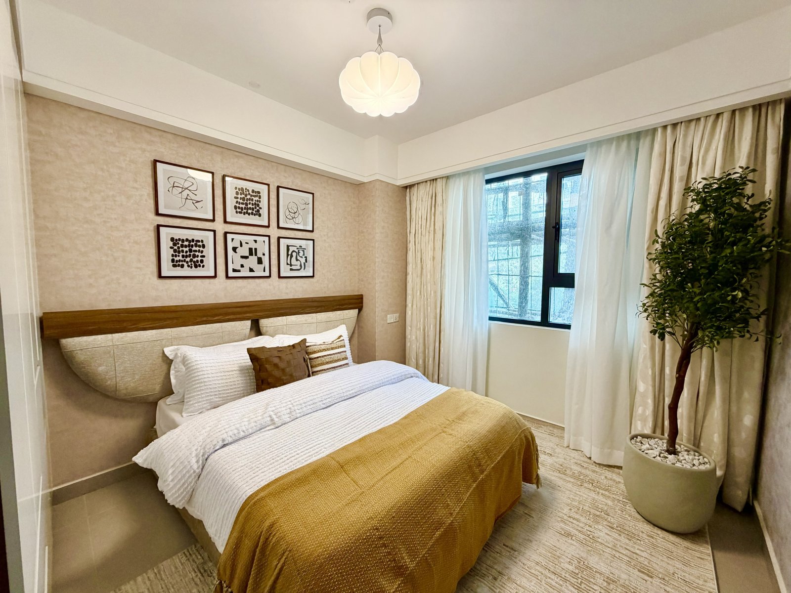 Elegant master bedroom of 1 Bedrooms At Skyline Apartments In Kilimani