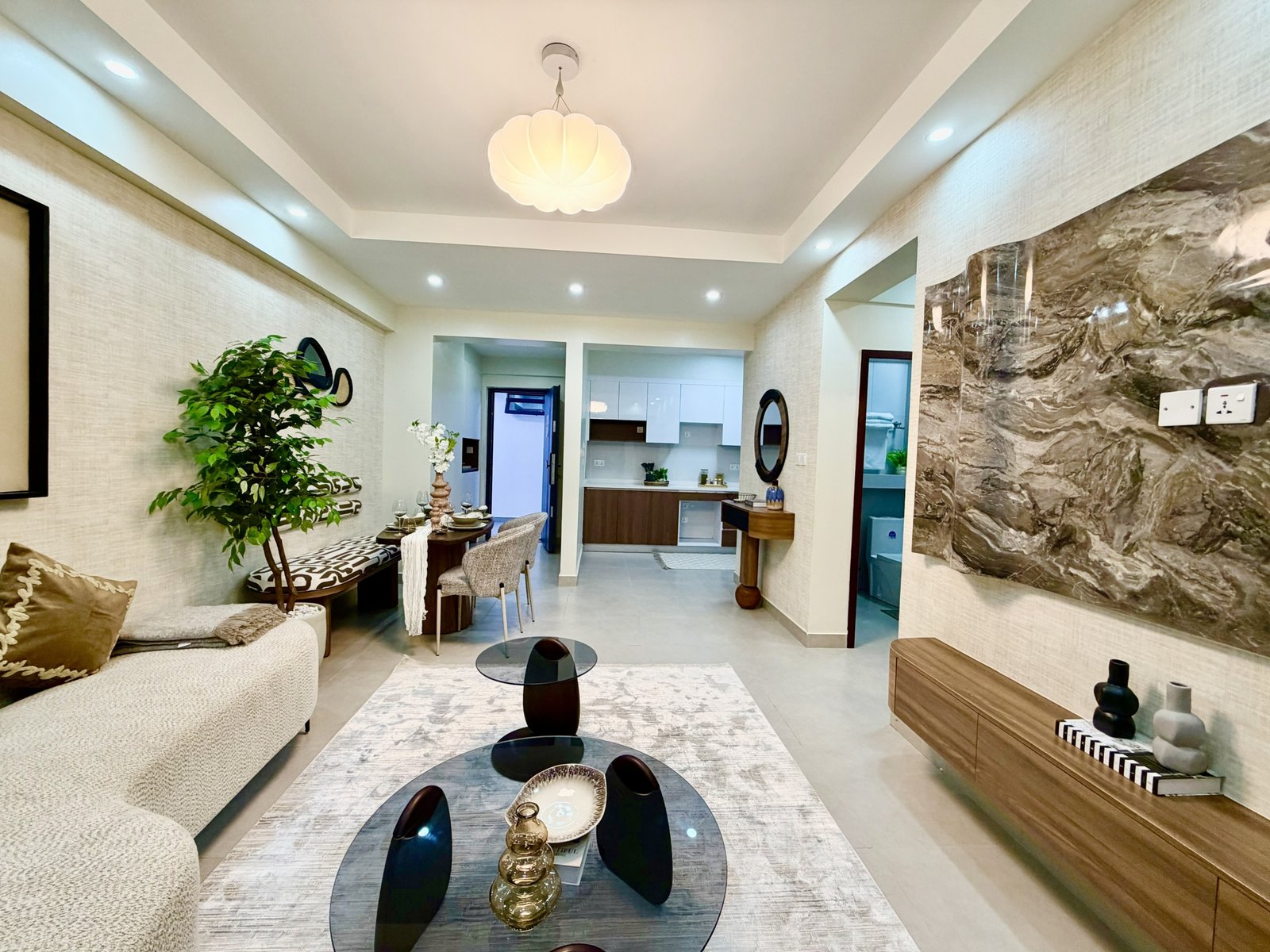 Living room area of 2 bedrooms at Skyline Apartments In Kilimani side view