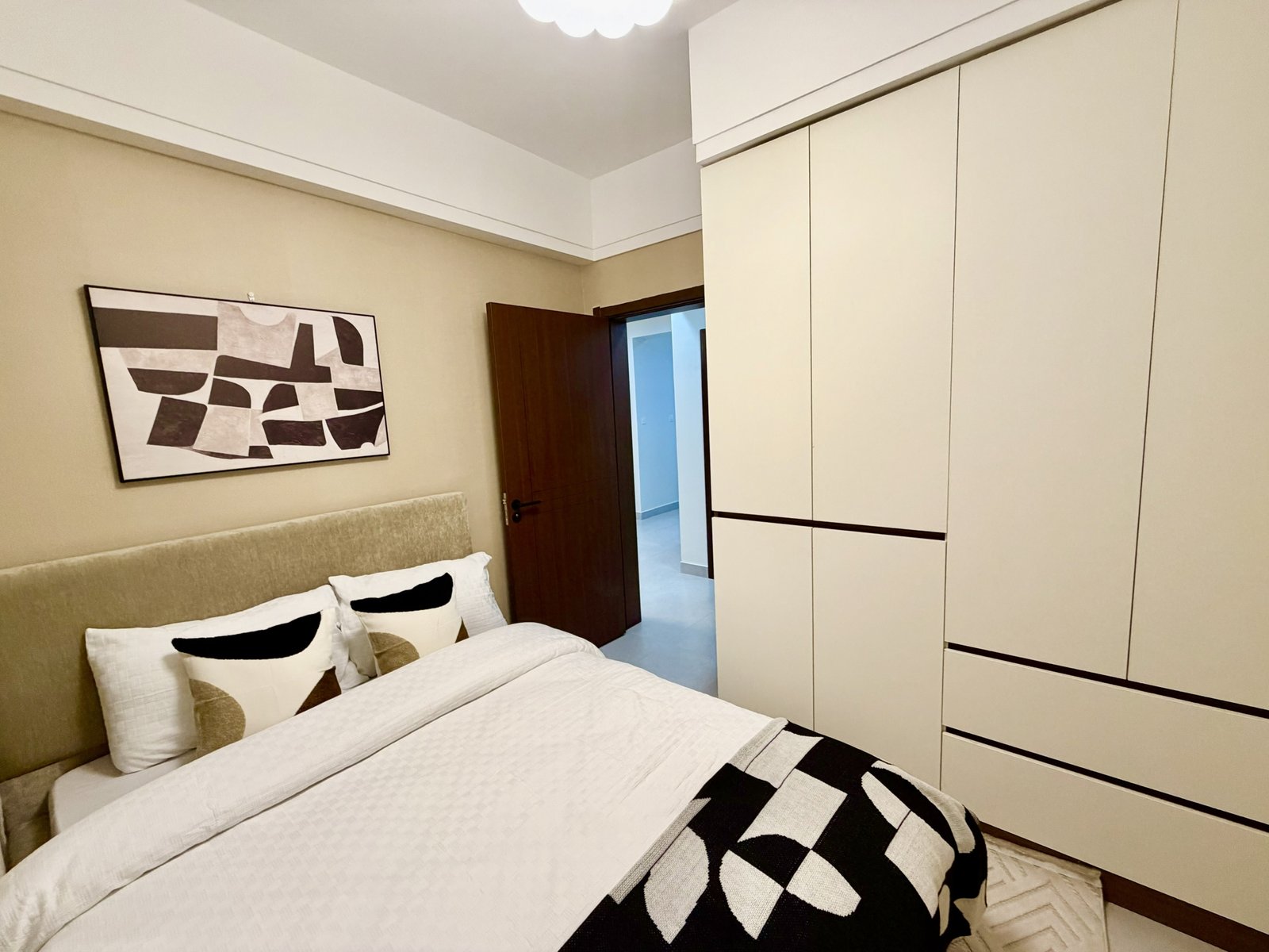 elegant bedroom area of 2 bedrooms at Skyline Apartments In Kilimani