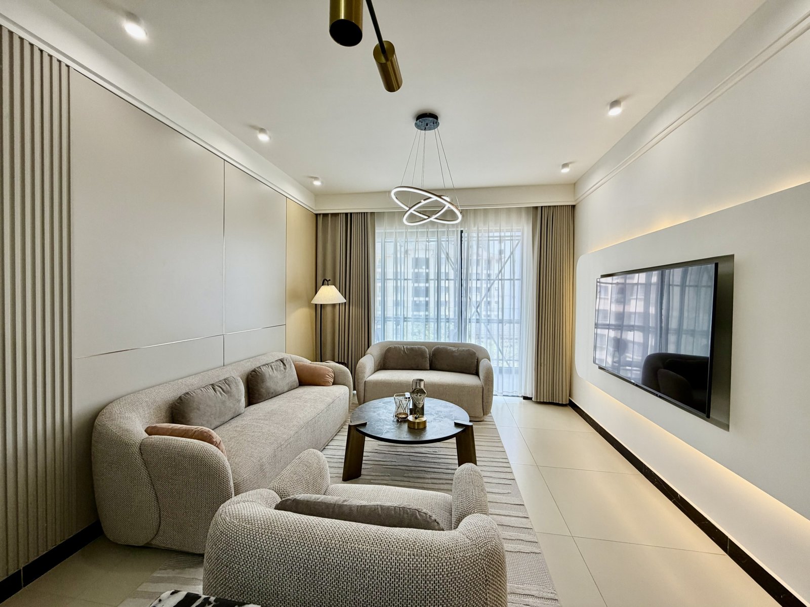 elegant living room area of 3 bedroom apartments for sale in Kileleshwa