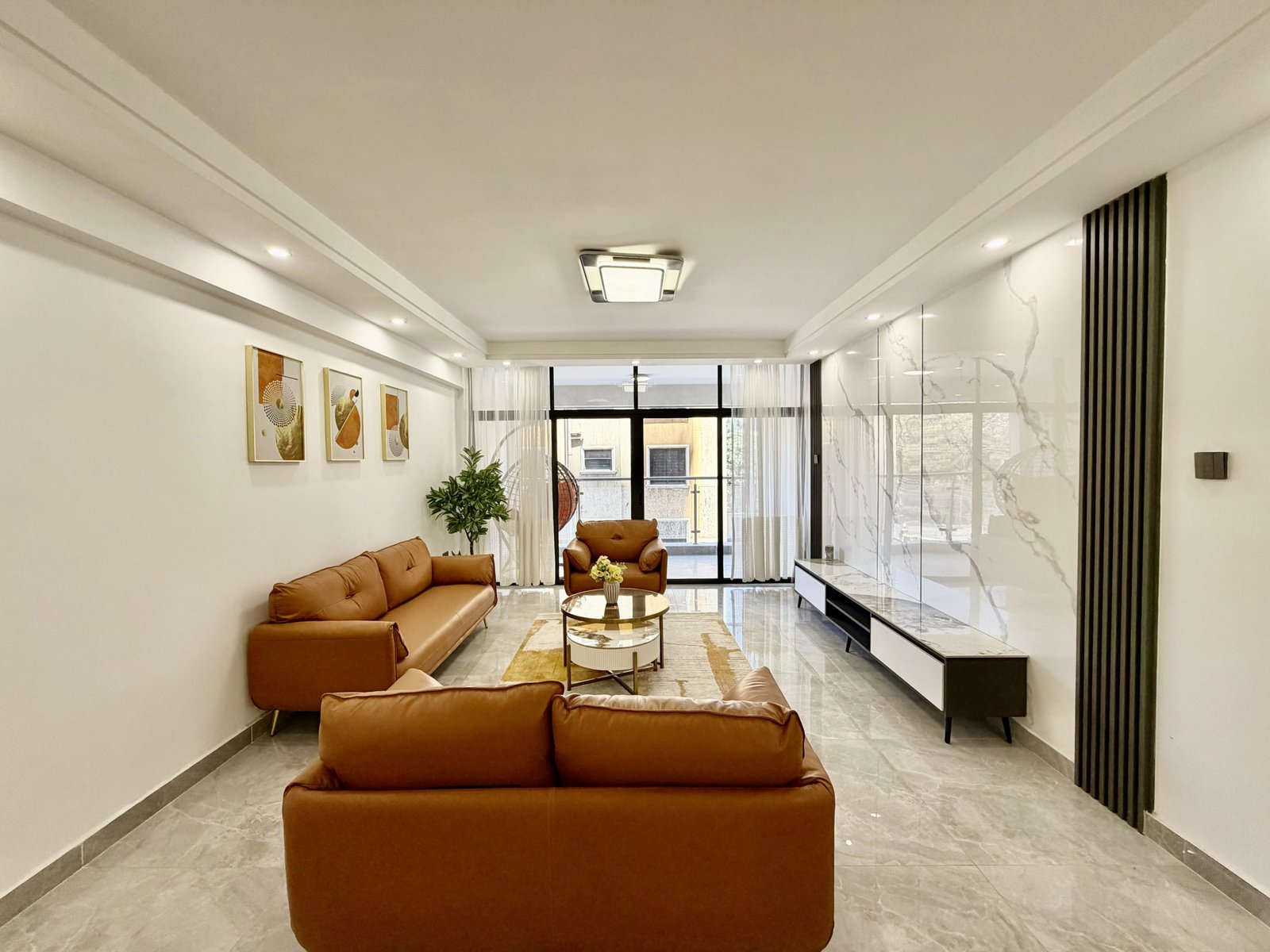 Spacious living room area of 3 bedrooms at Golden Street Residency In Kileleshwa