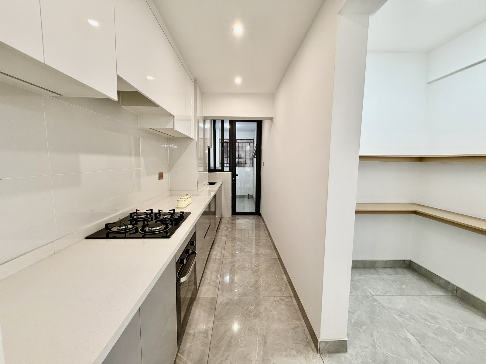 Modern designed kitchen area of 2 bedrooms at Crescent Residency In Kileleshwa