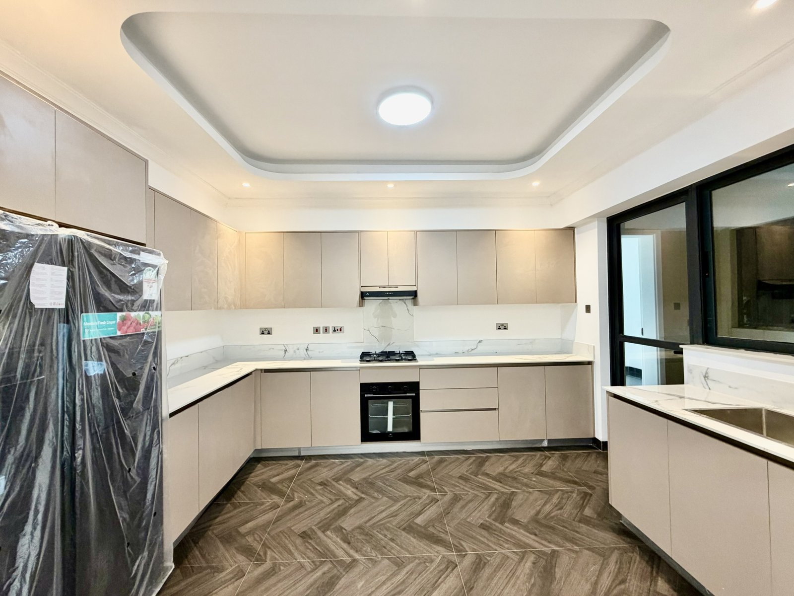 Modern designed kitchen area of 2 Bedrooms At Hookwood Residency In Westlands